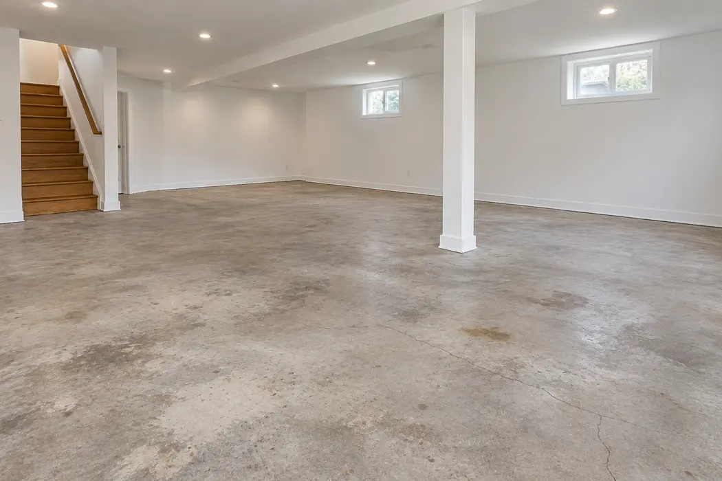 AI-generated sample metallic epoxy basement floor before coating